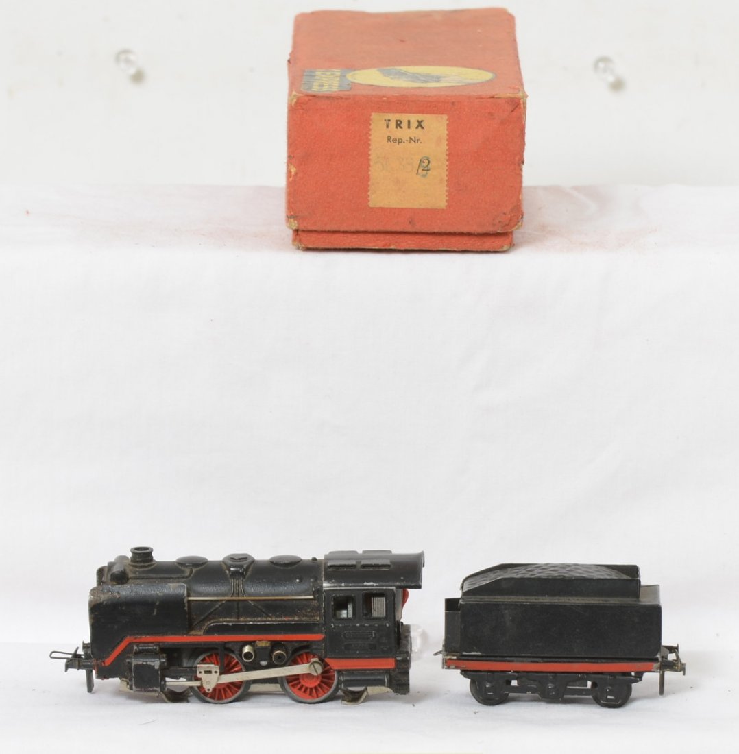Trix Express HO 0-4-0 steam locomotive with box: Trix Express HO 0-4-0 steam locomotive in OB. Box label is faded but I believe reads 5639. Loco is C6-7 with some paint wear on the smoke deflectors. No major casting fatigue. OB has some wear and par