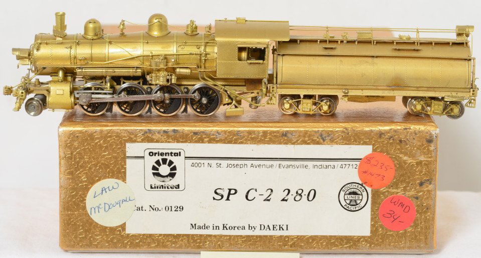 Oriental Limited Southern Pacific C-2 2-8-0 steam: Oriental Limited HO brass Southern Pacific C-2 2-8-0 steam locomotive in OB. Catalog number is 0129. Loco is C7-8 condition, a few light spots of minor discoloration on the tender. OB also has some li