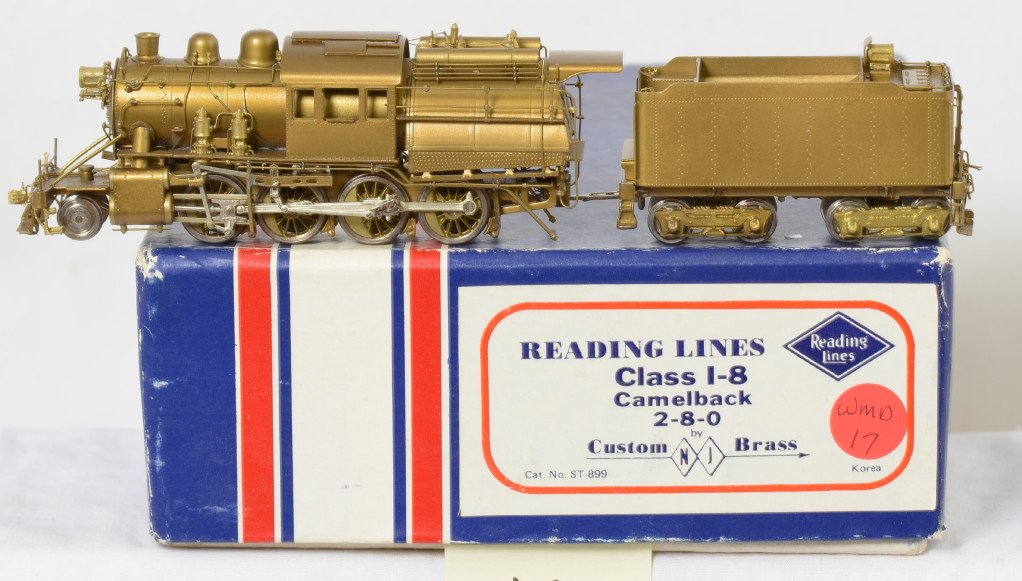 NJ Brass Reading I-8 2-8-0 Camelback steam locomotive: NJ Custom Brass Reading I-8 camelback 2-8-0 steam locomotive in OB, Catalog number ST-899. Loco is C8 condition. One very small dark spot on the tender. Locomotive original box has light corner and ed