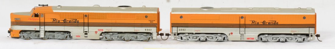 HO Rio Grande Alco PA A-B set: Rio Grande HO Alco PA A-B set. Loco is diecast body and frame. B unit shell is plastic. Equipped with Kadee couplers and in C7-8 condition with light wear.