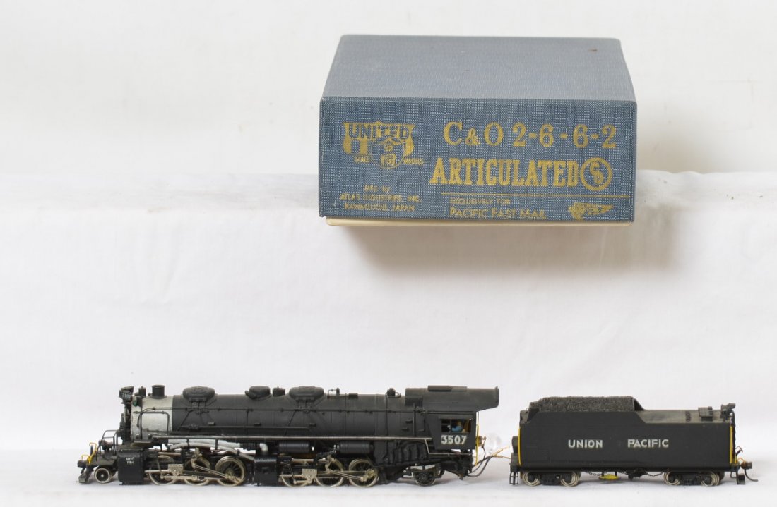 United / PFM Union Pacific 2-6-6-2 steam locomotive: United Models / Pacific Fast Mail HO brass Chesapeake and Ohio 2-6-6-2 steam locomotive painted for Union Pacific. Loco is nice C8 condition. OB has some light wear.
