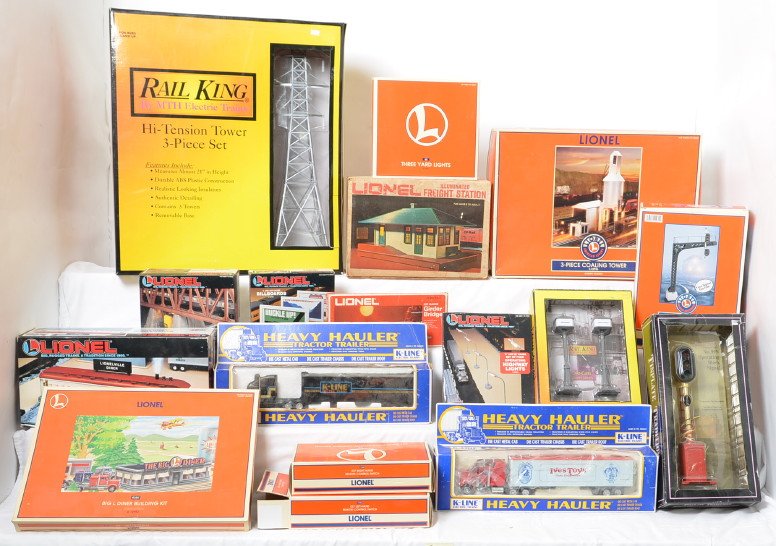 Large group of Lionel, MTH, and K Line accessories.: Large group of O gauge accessories from Lionel, K Line and MTH. MTH items include 1056 high tension tower set, 1068 lamp post set, and 1048 No.99N block signal. Lionel items include 12722 diner, 12707