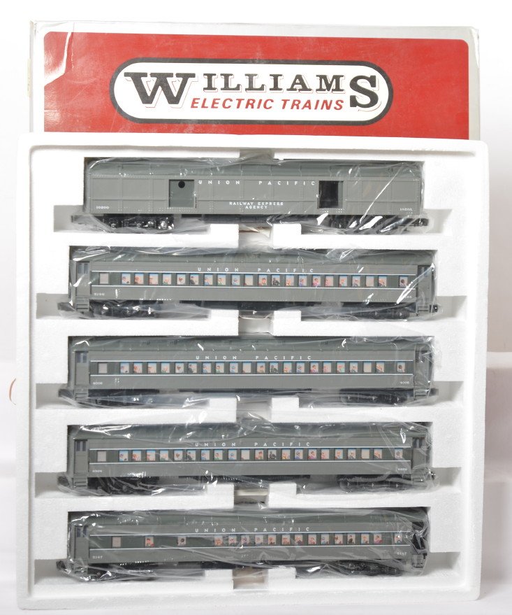 Williams 2701 Union Pacific 5 car Madison set: Williams modern O gauge 2701 Union Pacific 80Ã• scale Madison car set in OB. Set is C8 with run time. OB has corner wear and a few small rips.