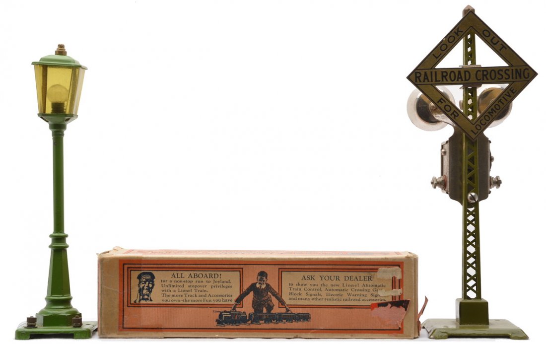 Lionel 56 P. Green Lamp Post OB 68 Signal: Lionel prewar O gauge no. 56 pea green lamp post in OB. Also included is a 69 olive electric warning signal with a brass sign and finial. The lamp post and signal are C8. The OB has some tape repair.