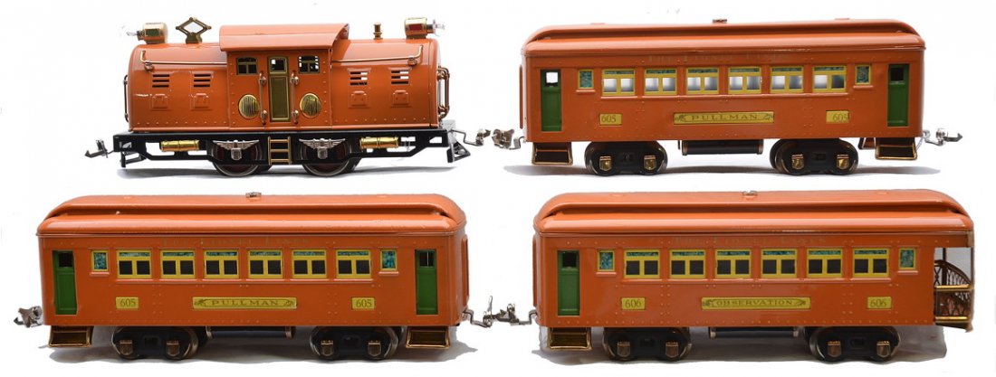 Lionel Prewar Orange Passenger Set no. 142: Lionel prewar O gauge orange passenger set no. 142 including; 254 electric loco with brass trim, two 605 Pullmans and a 606 observation. The cars have cream inserts and pea green doors. The set has be