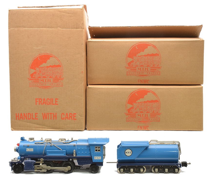 MTH Repro of Lionel Blue Comet 263 Loco 263t: MTH reproduction of Lionel prewar O gauge Blue Comet 263E steam loco and 263T tender in OBs with outer shipping carton. Loco and tender have nickel trim and journals. Tender has no whistle. Loco and t