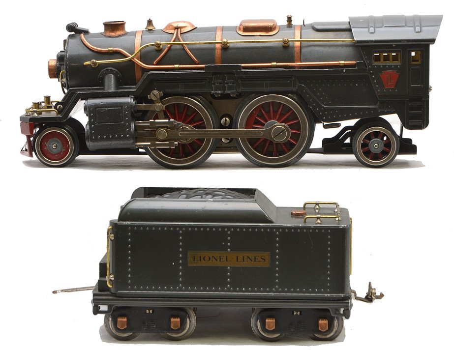 Lionel 385E Gunmetal Steam Loco 384T Tender: Lionel prewar standard gauge 385E gunmetal steam loco with a 384T tender with copper journals, both with brass and copper trim. The boiler front and cab roof have paint flaking, otherwise loco is C7. 