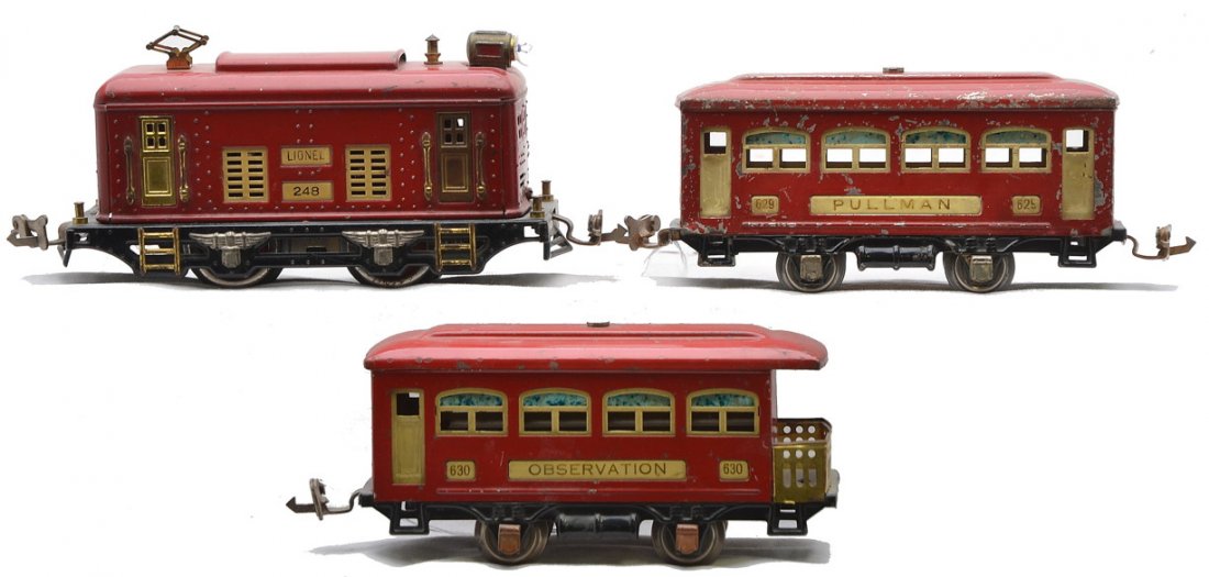 Lionel Prewar Red Passenger Set no. 292: Lionel prewar O gauge red passenger set no. 292 including; 248 electric loco with cream inserts and brass trim, 629 Pullman with nickel journals and a 630 observation with copper journals. The cars ha