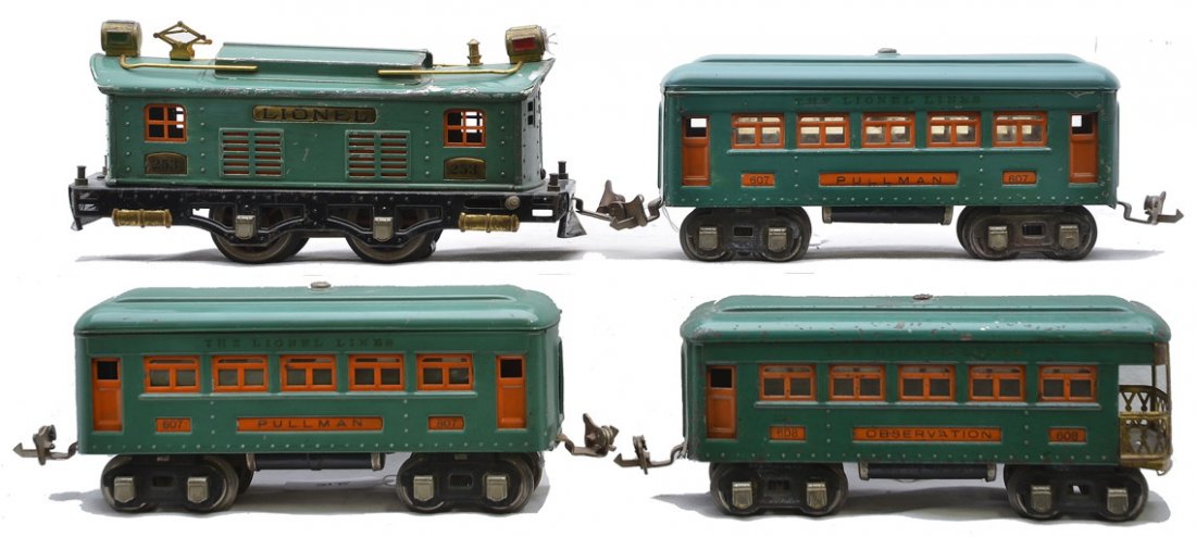 Lionel Prewar Peacock Passenger Set no. 296: Lionel prewar O gauge peacock passenger set no. 296, circa 1928 including; 253 electric loco with orange inserts and brass trim, two 607 Pullmans and a 608 observation. The cars have orange inserts an