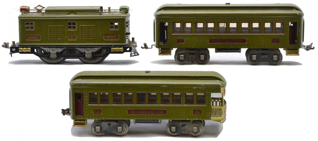 Lionel Olive Green Passenger Set no. 347E: Lionel prewar standard gauge olive green passenger set no. 347E including; 8 E electric loco with brass and nickel trim, 337 Pullman and a 338 observation. The cars have maroon inserts and nickel jour