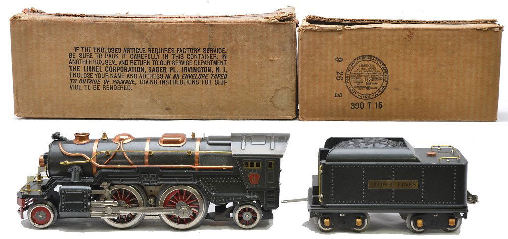 Lionel Std Ga 385E Gunmetal Loco 385T Boxed: Lionel prewar standard gauge 385E gunmetal steam loco with a 385T gunmetal tender in OBs. Both loco and tender have brass and copper trim. The frame and steam chest on boiler front on loco have been r