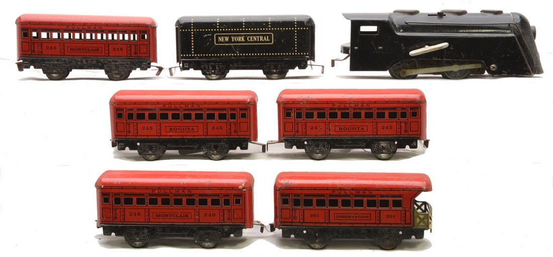 Marx Red/Black Lithographed Passenger Set: Marx prewar O gauge red and black lithographed passenger set including; black 232 clockwork New York Central steam loco, New York Central tender, two 245 Bogota Pullmans, two 246 Montclair Pullmans an