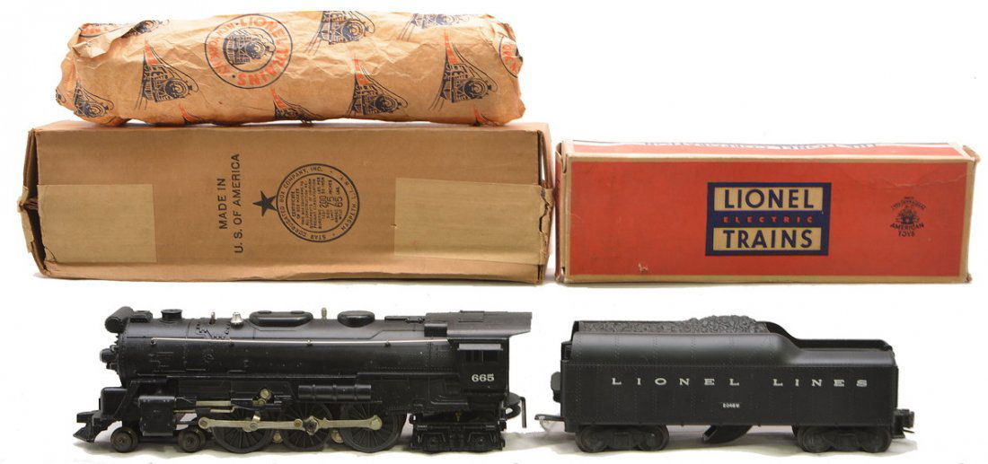 Lionel 665 Steam Loco 2046W Tender Boxed: Lionel postwar 665 steam loco with original paper wrap and a 2046W tender both in OBs, C8. Boxes have all flaps attached.