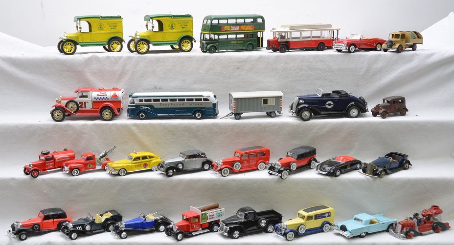 Selection of Die-Cast Vehicles: Selection of die-cast vehicles including; Solido, Liberty Classics, a Corgi bus, two Cal-Stewart Meet trucks, Dinky, Minic and two cast iron . The vehicles are in like new to excellent condition. Plea