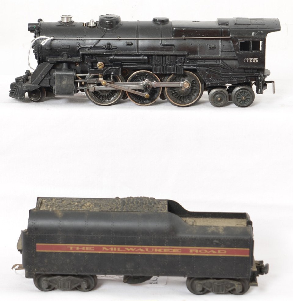 Lionel 675 steam loco w/2046W whistle tender: Postwar Lionel O gauge 675 steam locomotive with 2046W whistle tender. Loco is repainted and tender is redecorated. Trains are sold as they are shown in our photos with NO returns.