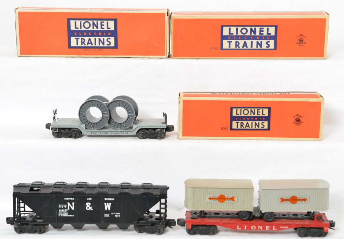 Lionel 6446 NW hopper, 6430 CJ flat, 6561 reels OB: Lionel postwar O gauge 6446 Norfolk and Western hopper, 6430 Cooper Jarrett flatcar with original trailers and a 6561 cab reels with depressed center flatcar. One hatch is missing on the hopper. C7+.