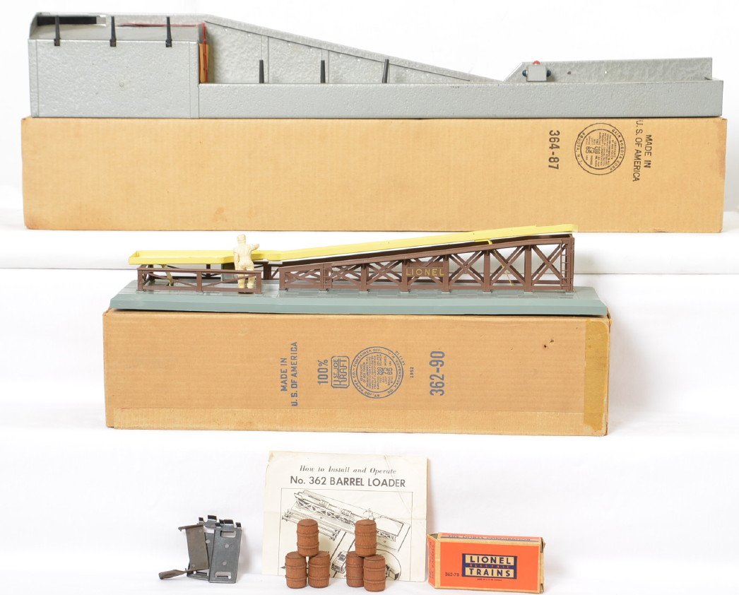 Lionel 362 and 364 operating accessories in OB: Postwar Lionel O gauge 362 barrel loader and 364 lumber loader in original boxes, C8-9. 364 box is super square and solid but has masking tape. 362 OB has very small punctures, otherwise it looks C8+.