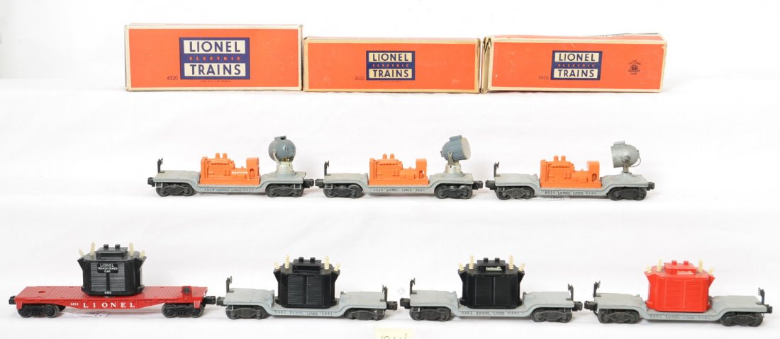Lionel 3520, 3620, 6520, 2461, 2461, 6461, 6818, 3 OB: Postwar Lionel O gauge searchlight cars: 3520, 3620, and 6520; transformer cars: 2461, 2461, 6461, and 6818. Trains look C6 area. 3520, 3620, and 6520 boxes with tears, missing flaps, etc.