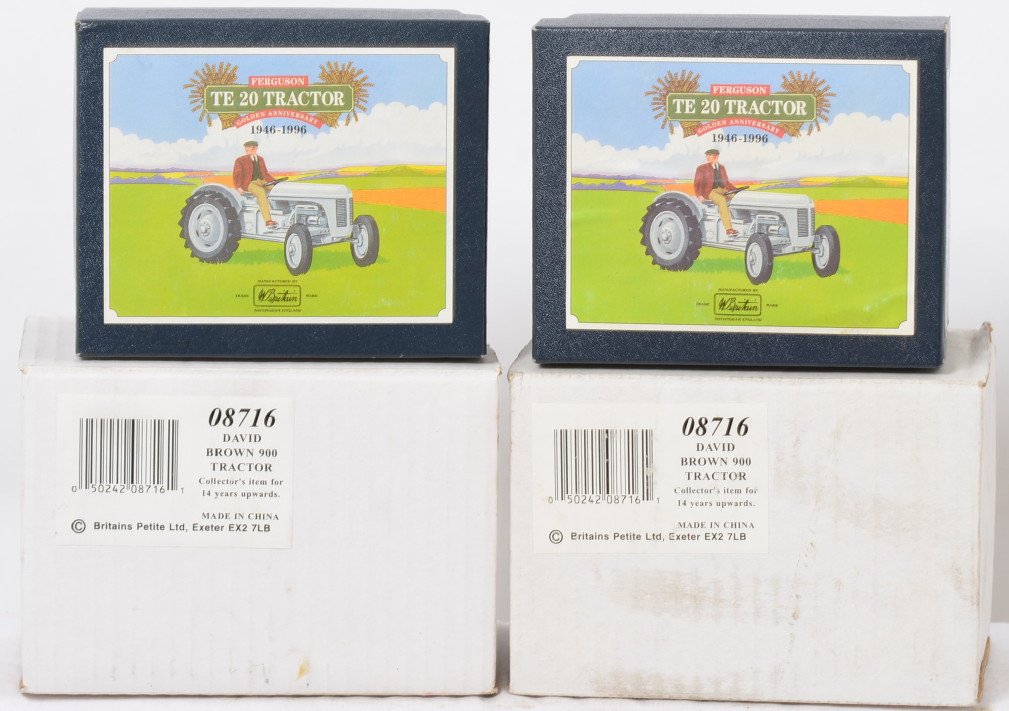 Britains Petite Ltd. 8711 x2 and 08716 x2 in OB: Modern Britains Petite Ltd. farm tractors in original boxes, C9-10. boxes show little wear. Two 8711 Ferguson TE 20 tractor and two 08716 David Brown 900 tractor.