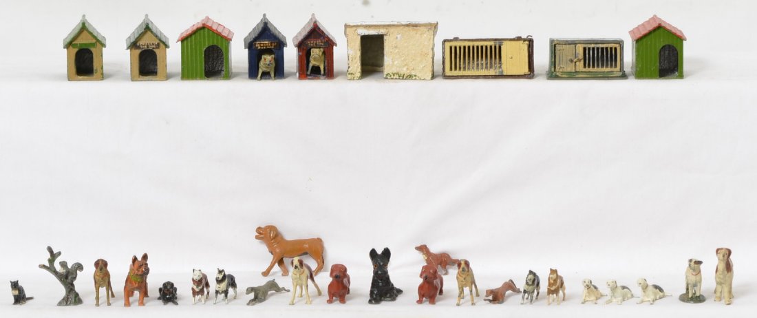 Large group of diecast lead Britains dogs, houses, etc.: Large group of diecast lead Britains and other makers, dogs, dog houses, rabbit hutches, and squirrel on tree. Dacshund, Scotty, Greyhounds, Bulldogs, Collies, Saint Bernards, and one cat. Animals and