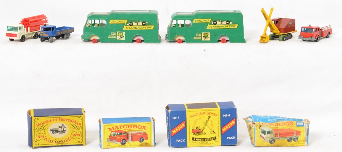 Matchbox, M-4, No. 4, 58, 29, two No. K-5 some boxes: Diecast Lesney Matchbox trucks and steam shovel with some original boxes. Two No. K-5 Racing Transporters missing tires. Major Pack No. 4 steam shovel, No. 50 DAF Girder truck, No. 29 Fire Pumper Truc