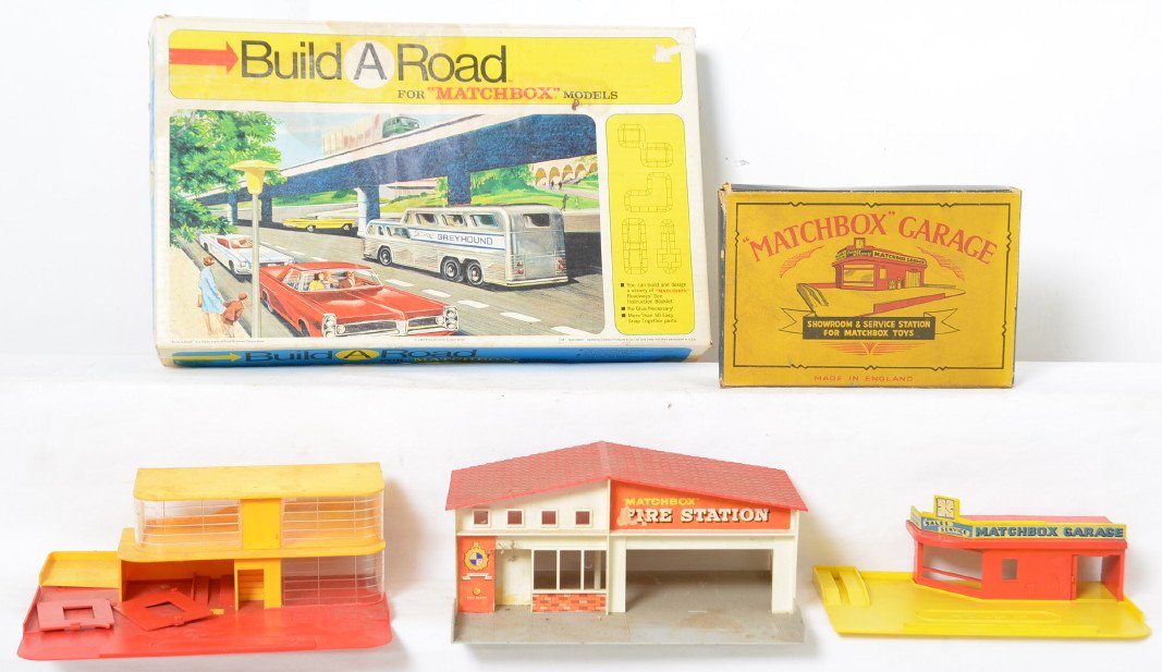 Matchbox BR-1, Garage, Fire Station, Garage, some OBs: Group of Lesney Matchbox plastic buildings and Build A Road set. No. BR-1 set looks to be complete and looks C8-10. Three loose plastic buildings, two garages and a fire station, may or may not be com