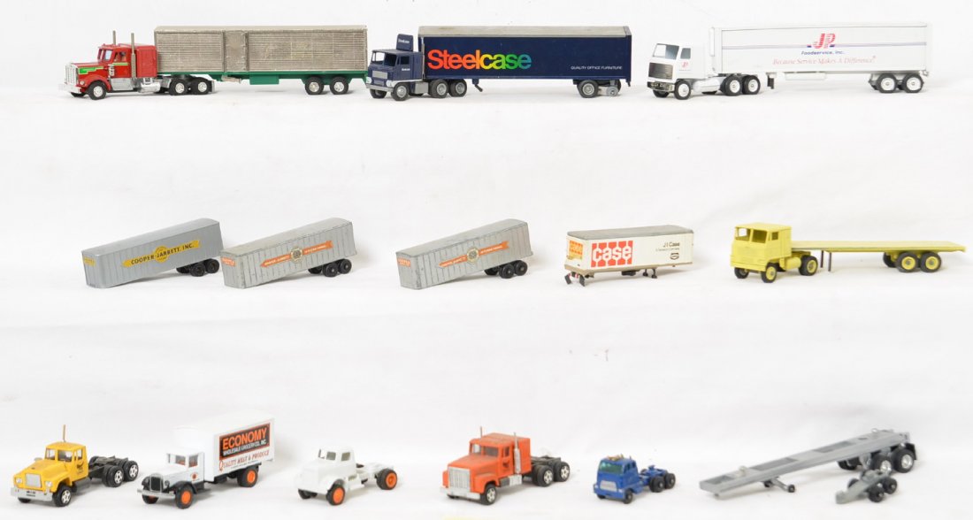 Group of diecast semi tractors, trailers, delivery: Group of diecast toy semi tractors, trailers, and other delivery trucks. American Highway Legends AHL, Winross, Matchbox, Ertl, Lionel, Shinsei Mini Power. Some missing pieces/trim, loose pieces, miss