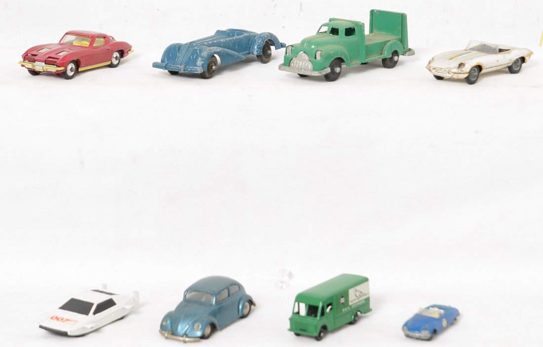 Manoil, Corgi, Tekno, Budgie, and Lone Star diecast: Group of mixed diecast cars and trucks, Manoil, Corgi, Tekno, Budgie, and Lone Star. _x000B_Diecast lead toy cars, Manoil No. 708 convertible coupe and lumber? truck. Original played with condition wi