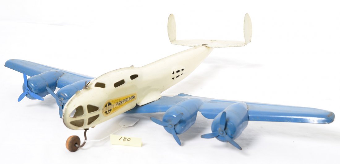 Fantastic Buddy L Transport Plane Pr. Steel: Super nice plane with very little play wear at all and only a tiny bit of paint loss. Both decals are perfect, it just has some dust on it and itÃ•s ready to display. The props may have a small ben