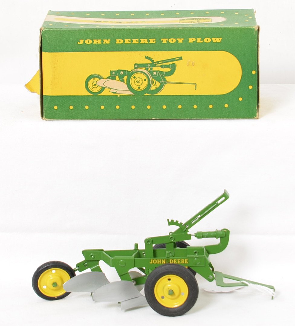 NOS Eska John Deere 2 Bottom Plow in Box: Stunning new old stock example in a beautiful box that has a turned up edge on one end flap and a small puncture on one side.