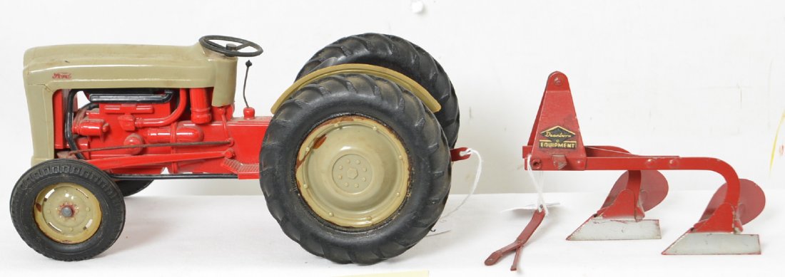 Ford Jubilee Product Miniature Tractor w/ Plow: Tractor appears to be complete but the wheels are loose on the rims and have glue residue on all of them. The steel plow must be exceedingly rare and is in great shape with Ã’Dearborn EquipmentÃ��