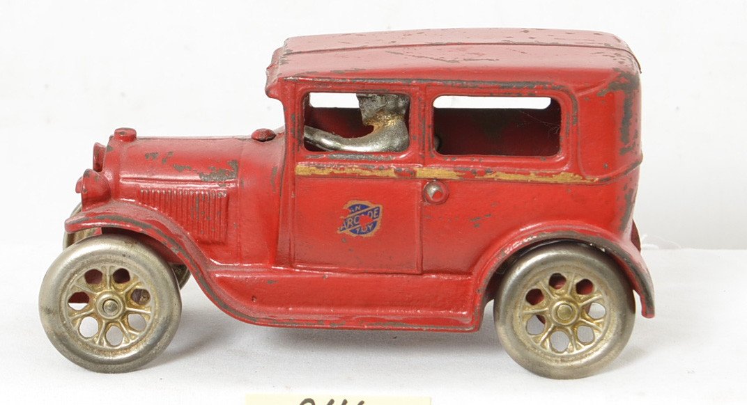 Arcade Model A Ford Tudor Sedan: Nice old toy with all original parts and paint including a partial decal on the drivers side door. There is some paint wear as seen but overall a great display piece.