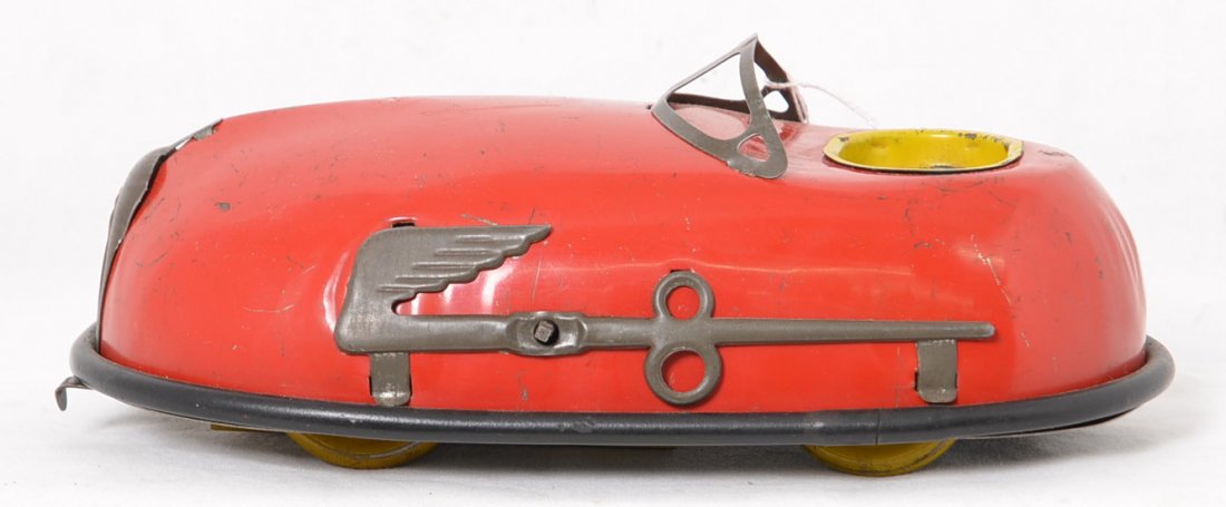 Skeeter Bug Wind Up Bumper Car: Vintage car in nice shape but missing both figures as well as the wind up key. Car has all original trim and nice paint with some small scratches from play wear.