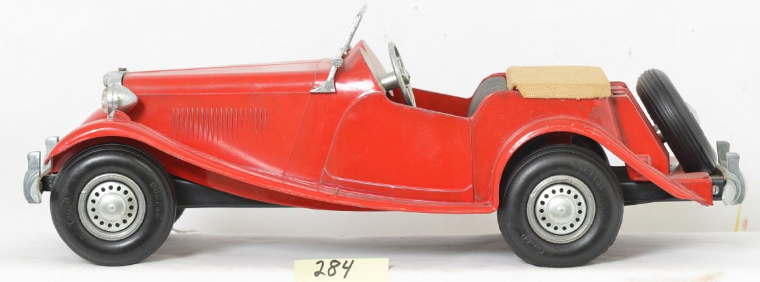 Doepke Model Toys Die Cast MG: Nice shape with all original parts and very little paint loss. There are two very small touchups on the hood and some dust on the toy but great shape otherwise.