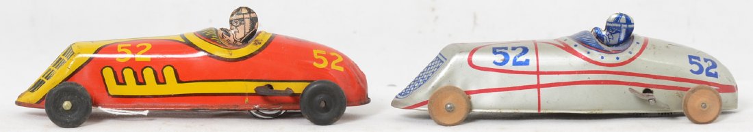Chein Tin Wind Up #52 Racers: Both cars are in nice shape but only the silver one has a working clockwork mechanism. The red car has a few small chunks missing from a few tires and has some minor litho wear. Both cars are 6 1/2Ã�