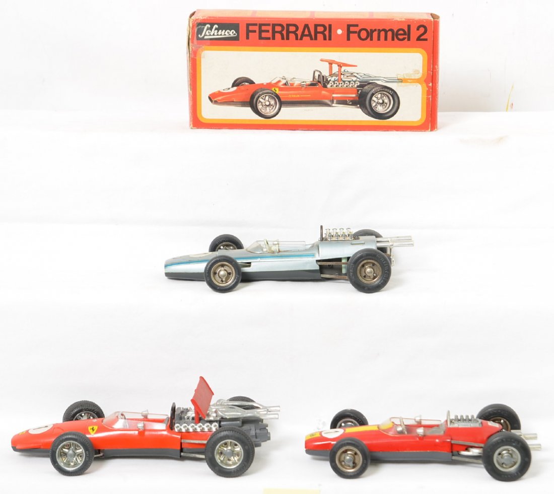 Schuco Formel 2 Ferrari Lotus BMW Racers: All three cars are in working condition and appear to be complete with no broken or missing parts; two keys are included for the three cars. The Lotus does have some paint touch ups and all three of t