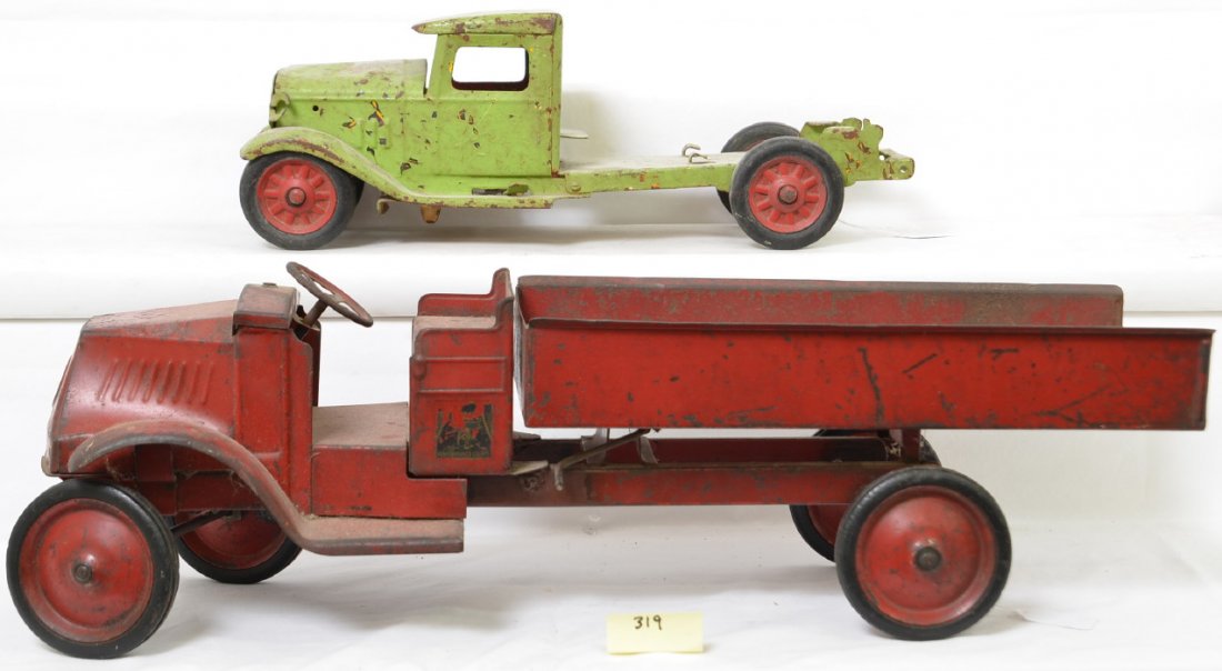 Steelcraft Mack Dump Truck & Buddy L Cab: Steelcraft truck appears to have all original parts with the exception of one screw. The truck has had a couple welded repairs but retains great structural integrity and a nice patina. There are a lot