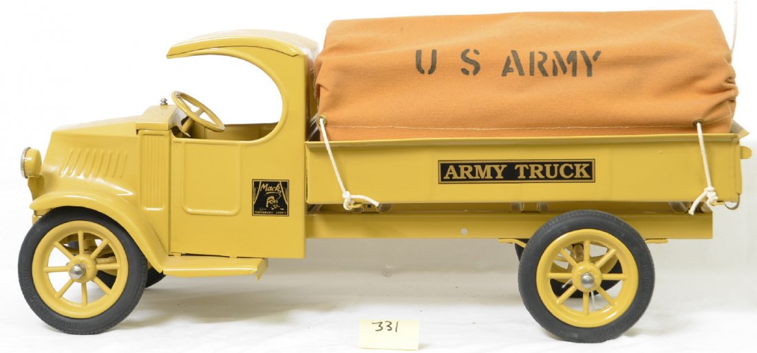 Steelcraft Mack Army Truck Restored: Truck has been professionally restored but has some decal issues on one side. Unsure as to how many replacement parts were used but the truck displays very nicely. The truck is 24 3/4Ã“ long.
