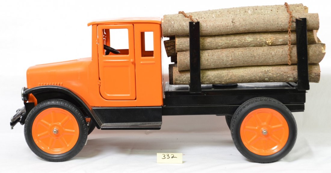 Restored Buddy L Log Truck: Not really sure what this was or is since the truck has something of a 5th wheel that isnÃ•t being used anymore. It may be a total reproduction or could be repainted old parts but the parts seem aw