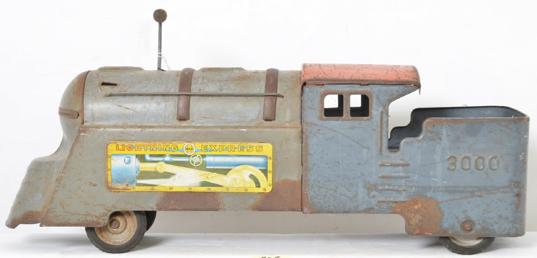 Marx Lightning Express Ride On Locomotive: Locomotive is all original with some scratches, missing paint and surface rust. Lithographs on sides are faded on one side and scratched and rusted on the opposite side. There are a couple missing par