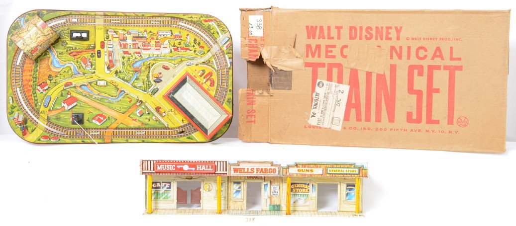 Group of Marx Tin Lithographed Toys: Group includes a Walt Disney Mechanical Train Set (missing the train) with a nice clean and colorful track layout in original box, Silver dollar street front in nice shape but no accessories and anoth