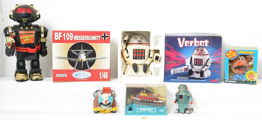 Group of Robot Toys & Boaterific Tug: Group of toys including a Tomy Verbot in Box and Ideal Boaterific Tug boat along with a few other modern robots and Mr Potato Head massager.