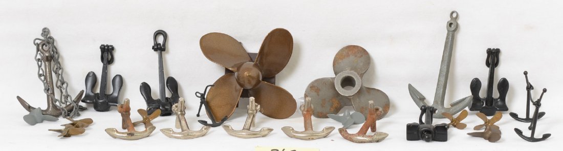 Group of Maritime Collectibles Anchors & Props: Lot includes 14 anchors in 5 different styles made of die cast or cast iron. Also includes 10 propellers made of cast iron, die cats and plastic. The largest anchor is 3 1/2Ã“ long.