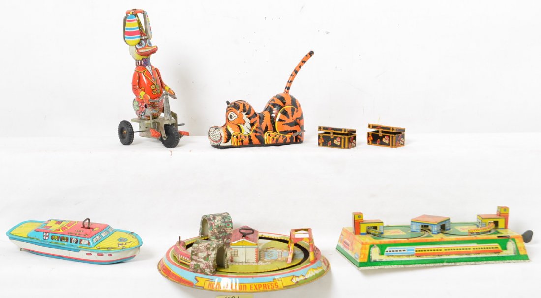 Group of Marx & Others Tin Litho Windups: Lot includes Marx Bengal Tiger and Honeymoon Express, Chein Marx I cabin cruiser, and two other unmarked tin toys. Everything works but the bird on bicycle is a bit sluggish. Also included in the lot