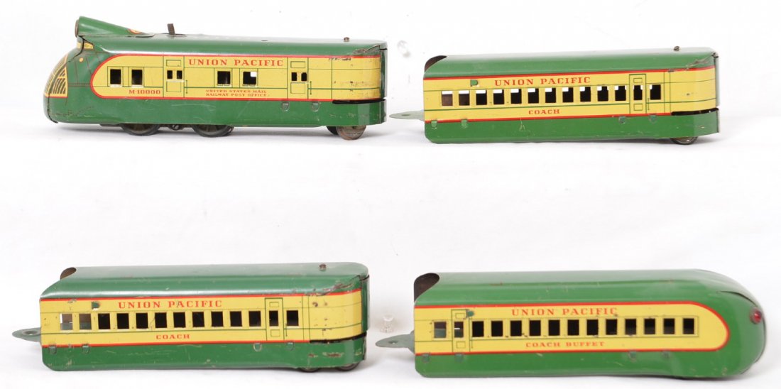 Marx 4 Piece M-10000 Electric Passenger Set: This is a nice looking set with minor wear and mostly small scratches and some larger rubs where the cars abut each other. The set is dusty and will need cleaned up. Operability has not been tested.