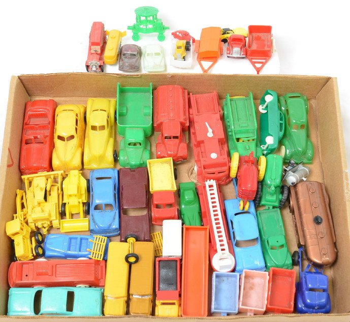 Large Group of Plastic Toy Vehicles: This lot includes toys from makers such as Lapin, Ideal, Banner and Lindberg. there are many unmarked as well. Most are in great shape but a few have some damage or mold flaws. Mainly sized for O scal