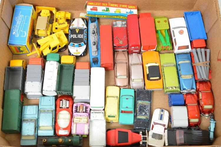 Large Group of Matchbox Superfast & Regular Wheels: Lot includes mainly Matchbox vehicles but there are a few odd pieces mixed in. Conditions vary from one mint in box Mercedes trailer to loose and worn vehicles. Most are complete but a couple have mis