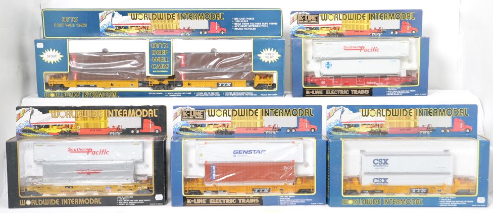 11 K Line DTTX and TTX cars 7793, 7764, etc: K Line modern O gauge DTTX and TTX deep well Intermodal cars in OBs. Eleven cars include two 7793 DTTX, 7764 CSX DTTX, 779422 two pack, 7752 APL DTTX, 7762 Burlington Northern, two 7767 Union Pacific,