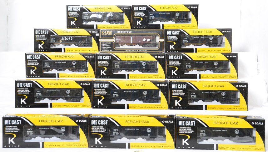 14 K Line B&O die cast coal hoppers: K Line modern O gauge die cast Baltimore and Ohio hoppers in OBs. Fourteen hoppers total all with the K623- prefix. Cars include the following three 10961 one with a broken truck mounting screw, three