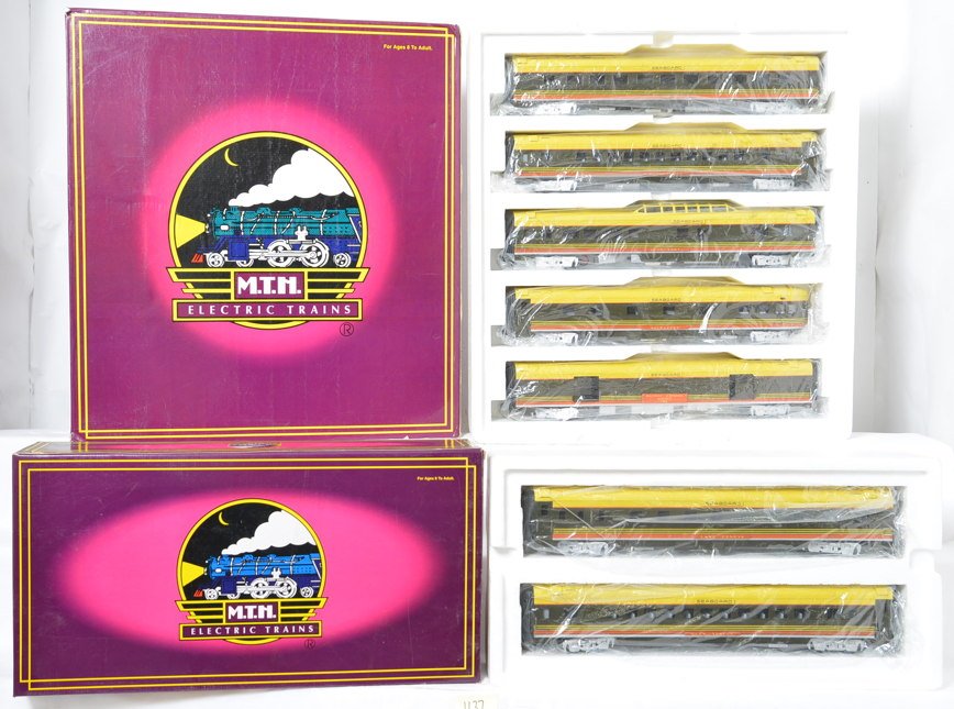 MTH 20-6515 and 20-6615 Seaboard passenger set: MTH modern O gauge 20-6515 and 20-6515, Seaboard Orange Blossom Special passenger train in OBs. Includes five car set and two car sleeper / diner set. Cars are C8 with run time. OBs have some light co